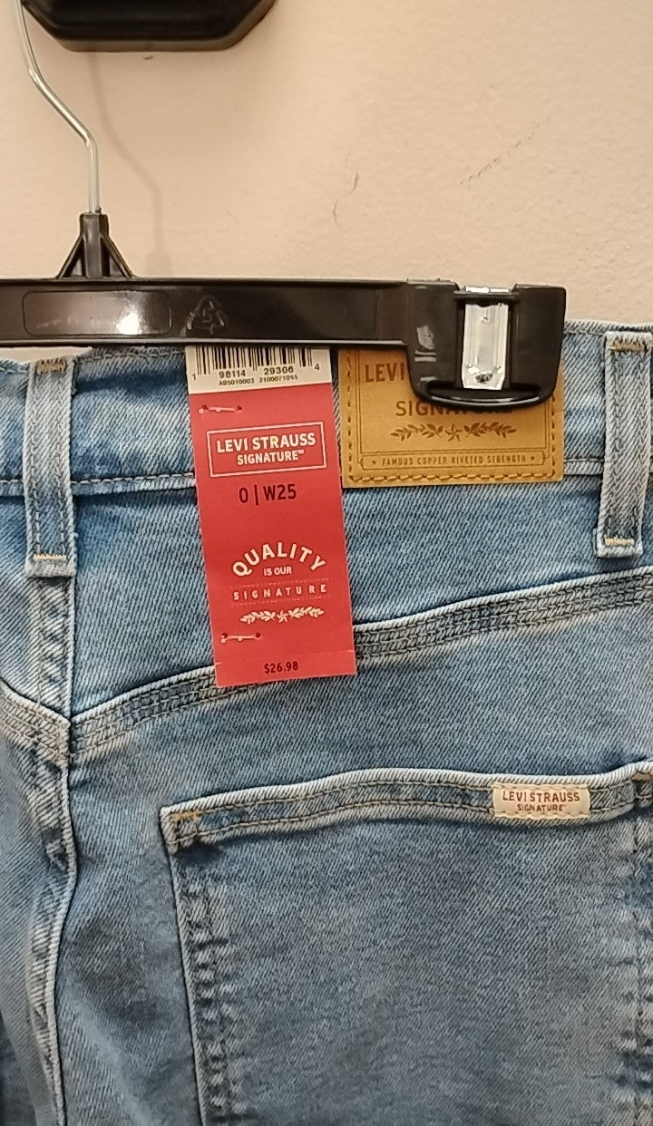 Size 0 Levi Jeans with product tag showcasing quality and brand details on denim fabric.